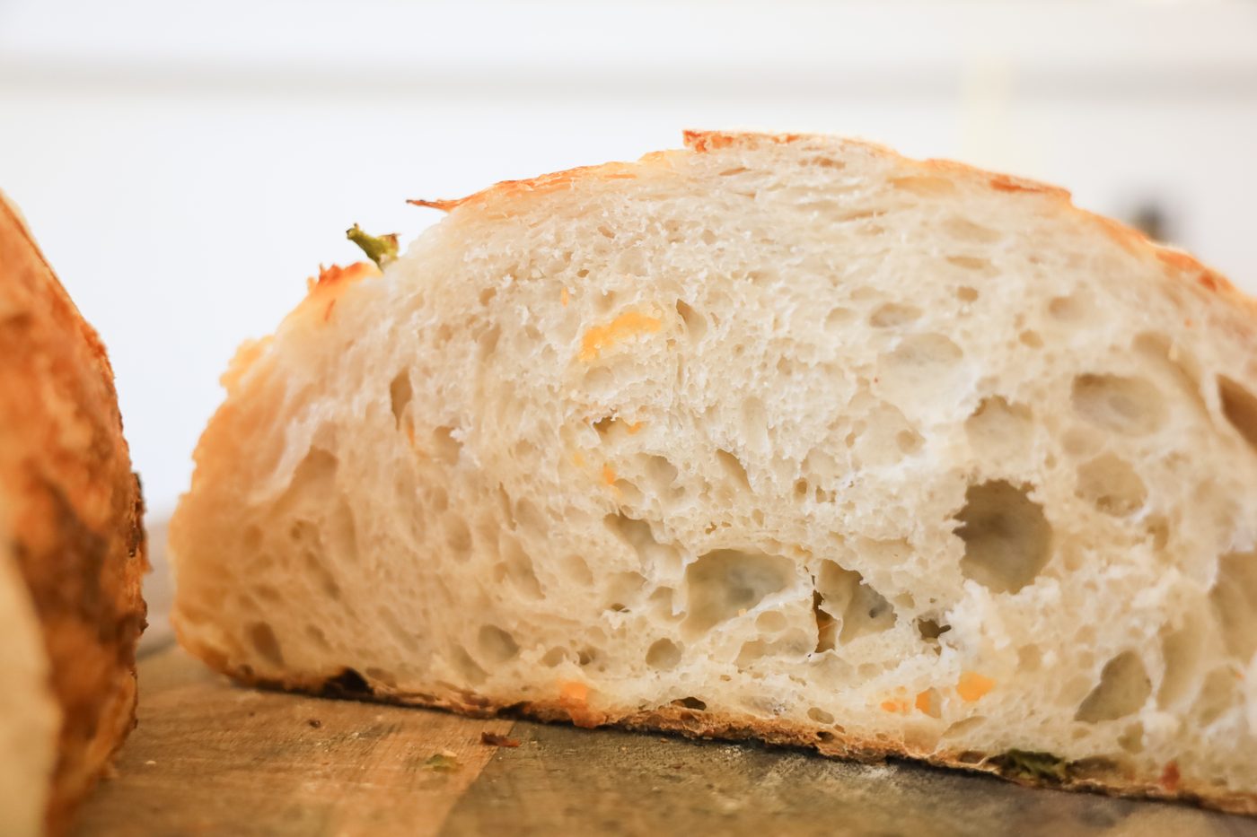 The open, tender crumb of a slow-fermented sourdough loaf